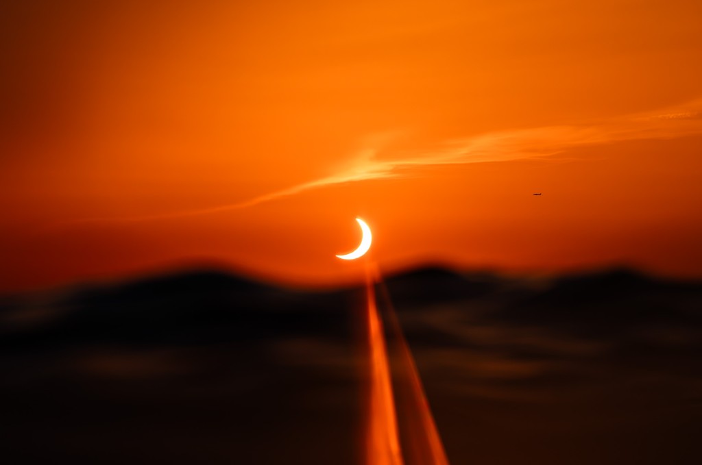 UN SOL A MEDIAS